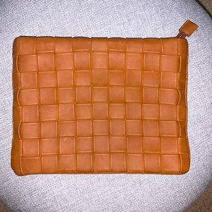 Tan clutch bag